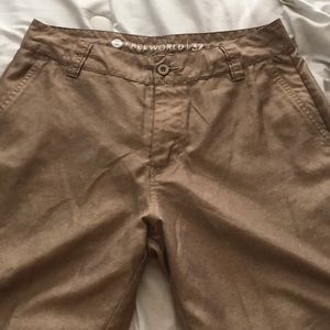 Freeworld hybrid dri fit shorts with strings.